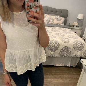Old Navy size XS white. Sleeveless, peplum blouse